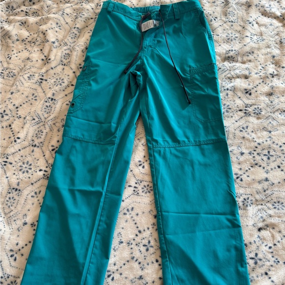 Cherokee Infiniti teal scrubs for men. Top and pants included in the sale. - Picture 3 of 4